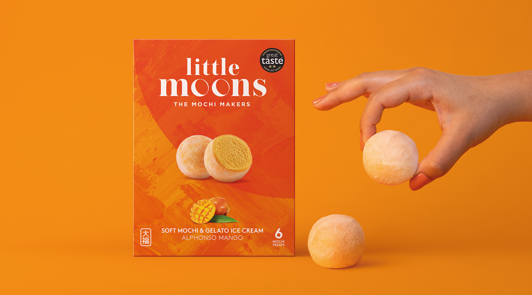 Little Moons Carousel Mangos Hand.jpg